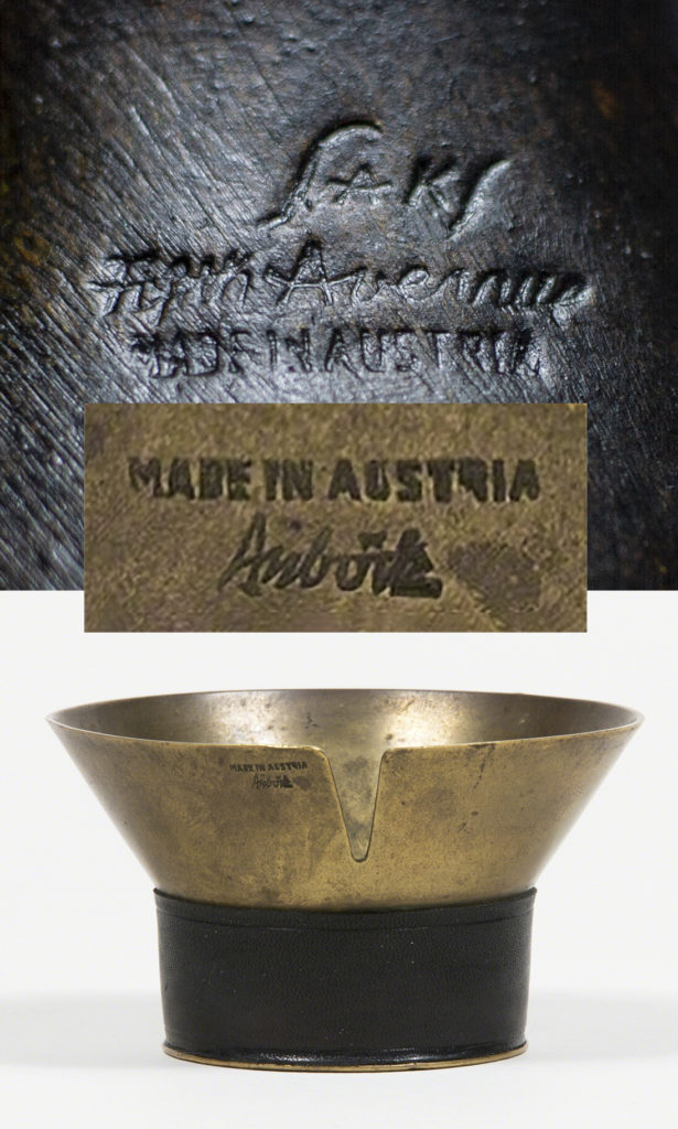Closeup comparison of Auböck's "Made in Austria" marks and Ashtray and "Made in Austria"  figa lighter's marks.